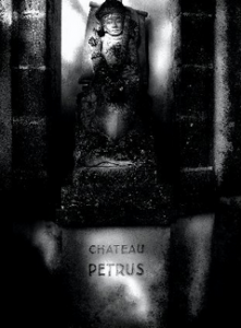 Stone tablet and statue at the entrance of Pétrus in Pomerol