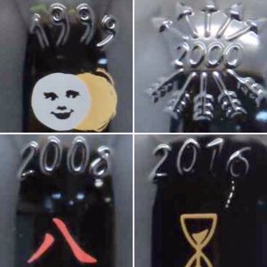 Logos on bottles of Château Lafite 1999, 2000, 2008, and 2016