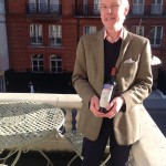 Stuart George with a bottle of Chateau Mouton Rothschild 1980